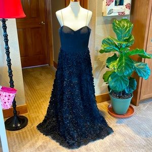 Spaghetti straps on this beauty perfect for a formal event.